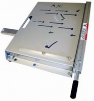 A metallic sliding jig used for precise cutting and alignment in woodworking or manufacturing applications.
