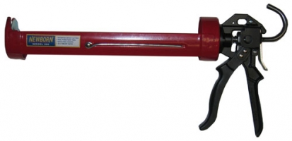 Red caulking gun with black handle and trigger for dispensing sealants and adhesives.