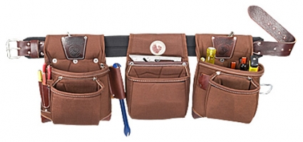 A brown canvas tool belt with multiple pockets holding various tools and writing instruments.