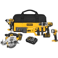 A set of DeWalt power tools including a drill, impact driver, circular saw, work light, and battery pack, all in a carrying case.