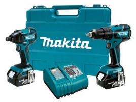 A Makita power tool set featuring a drill and impact driver, a battery, and a charger, all stored in a blue carrying case.