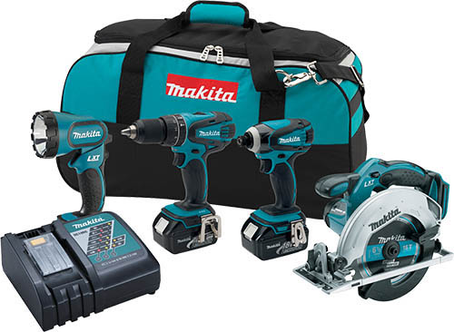 A Makita tool set featuring a battery charger, two cordless drills, and a circular saw, all arranged next to a sturdy carrying bag.