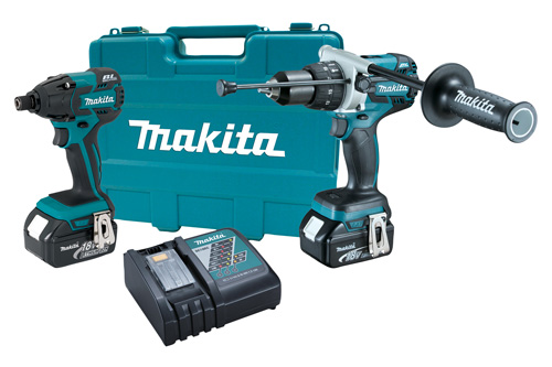 Makita cordless drill and impact driver set with a charging station and carrying case.