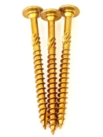 Three gold-colored screws with flat heads and spiral threads
