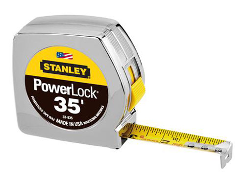 Close-up of a Stanley PowerLock 35-foot tape measure, showing the metal casing and yellow measuring tape extended.