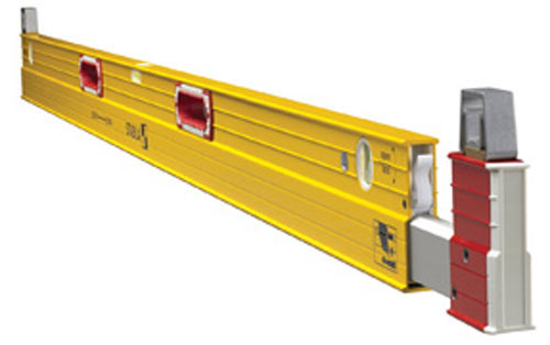 A long, yellow aluminum level tool with red accents, featuring bubble vials for measuring horizontal and vertical alignment.