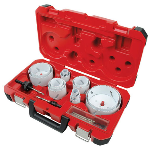 A red tool case containing various sizes of hole saws, a mandrel, and drill bits, designed for cutting holes in different materials.