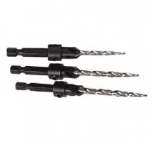 Three black drill bits with metal tips arranged in a row.
