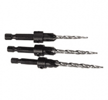 Three metal drill bits with hex shank attachments, arranged in a row.