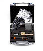 An open tool kit in a hard case featuring various components including cleaning tools, brushes, and plastic sleeves.