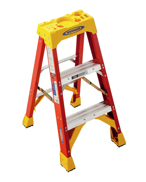 A bright red and yellow Werner step ladder with three steps and a sturdy design.