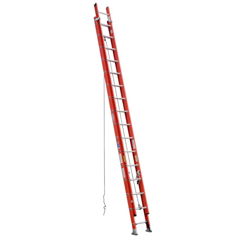 A tall, red extension ladder leaning against a wall, with rungs and a safety rope visible.