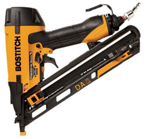 A BOSTITCH pneumatic nail gun with a black and orange design, used for construction and woodworking applications.