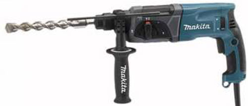 A Makita electric rotary hammer drill with a spiral drill bit attached, featuring a side handle and variable speed settings.